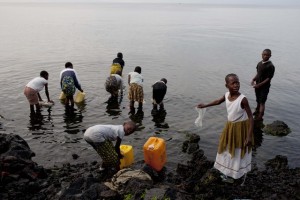 On 26 November, children  bearing jerrycans and other containers  collect water from Lake Kivu, in the city of Goma, in the province of North Kivu. Access to safe water is limited because electrical lines have been cut, reducing water pumping and chlorination. By late November 2012 in the Democratic Republic of the Congo, children and women continued to suffer from resurgent conflict between government forces and rebel groups. After a three-month ceasefire, violence erupted on 15 November in and around the city of Goma, in the province of North Kivu, following advances by the 23 March Movement (M23) rebel group. Security is still critical. The latest crisis affected at least 70,000 children, of whom over 670 are unaccompanied or have been separated from their families. In Goma and surrounding areas, an estimated 130,000 people have been displaced; they are among over 900,000 displaced in the province. Recruitment of children into armed groups, lootings, and summary executions have also been reported. Gender-based violence, including rape and sexual assault, which has been endemic to this conflict for more than a decade, continues. Additionally, hundreds of schools have been looted or damaged since September. UNICEF, in coordination with other partners, supports ongoing relief efforts in the areas of water, sanitation and hygiene, education, child protection, health and nutrition and the provision of critical non-food items and shelter. To meet the immediate and medium-term needs of affected children and women over the next three months, UNICEF has requested an initial US$13.8 million, of which over 55 per cent had been received by 5 December.