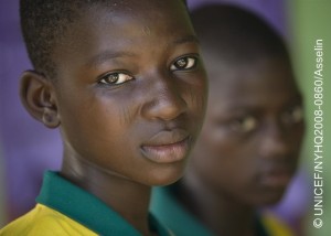 (Left-right) Azara Mohammed, 14, and Humu Baba, 13, visit a guinea-worm containment centre in the town of Savelugu, capital of Savelugu-Nanton District in Northern Region. Both children were previously infected with guinea-worm disease, a painful and debilitating infection caused by a parasite ingested through drinking contaminated water. Children under 16, who are more likely to play in or drink from infected water sources, are most affected. [#1 IN SEQUENCE OF TWO] In September 2008 in Ghana, economic growth and government reforms continue to improve the lives of children and families. The country is on track to achieve several United Nations Millennium Development Goals (MDGs). However, progress is uneven. The northern regions, which account for half of the countrys population living below the poverty line, are the most impoverished, and there are wide regional and rural/urban disparities in child and maternal mortality. And while 78 per cent of the entire population has access to improved drinking water sources and 60.7 per cent have access to improved sanitation, the north lags well behind these percentages. Working with the Government and other partners, UNICEF supports health, nutrition, education and protection interventions, as well as a range of integrated water, sanitation and hygiene (WASH) interventions, including to eradicate guinea-worm disease in endemic districts.