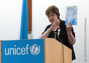 UNICEF Statistics and Monitoring Associate Director Tessa Wardlaw speaks at the launch of Progress for Children: A report card on adolescents, at UNICEF House. She is holding a copy of the report. The podium bears the UNICEF logo.  On 24 April 2012, UNICEF launched Progress for Children: A report card on adolescents at UNICEF House. The report calls for increased attention to, and investment in, all aspects of the lives of the worlds 1.2 billion adolescents aged 10 and 19 years. Globally, despite significant health and education progress over the past 20 years, an estimated 1.4 million adolescents die each year from traffic injuries, childbirth complications, suicide, AIDS and other causes. Children entering adolescence are also increasingly at risk of violence, both domestic and other forms. Additionally, while 90 per cent of children of primary school age are in school, 71 million children of lower secondary school age do not attend school and 127 million young people, aged 15-24 years, are illiterate. Adolescents in sub-Saharan Africa  a group that is projected to be the largest adolescent population in the world by 2050  are particularly at risk. All these challenges combine to impede adolescent contributions to positive change  in environments where they can be both protected and encouraged to maximize their creativity, innovation and energy  helping to solve their own problems and problems in their communities. The Lancets Adolescent Series on Health was also launched at the event.