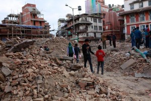 On 26 April, people walk around the historic Durbar Square destroyed by the earthquake on 25 April in Katmandu, the capital of Nepal. On 27 April 2015 in Nepal, relief operations continue in the aftermath of the massive 7.9 magnitude earthquake that hit the country on 25 April. The quakes epicentre was 80 kilometres from Kathmandu, the capital. The Government has declared a state of emergency in 35 affected districts in the country, where more than 1.3 million people  over half of whom are children  have been affected. More than 5,000 people have been estimated killed and 50,000 have been injured. Homes and vital infrastructure, including hospitals, have been severely damaged or destroyed, leaving thousands of children and families homeless, vulnerable and in urgent need of food, shelter, safe water, and sanitation and health support. Most of the displaced are sheltering in camps or in available open spaces. The situation has been continuing powerful aftershocks that have caused additional damage. Working with the Government and other partners, including fellow United Nations organizations, UNICEF is supporting water, sanitation and hygiene (WASH), health, nutrition, child protection, and education interventions. In response to the disaster, UNICEF is providing hospitals tents, tarpaulin sheeting, emergency medical kits, vaccines and related supplies, zinc and oral rehydration salts to prevent diarrhoeal disease outeaks, and temporary learning spaces and psychosocial counselling for children. UNICEF is also procuring emergency health kits, and is supporting water trucking services in camps for the displaced.