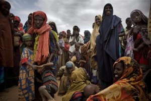 Somali refugees wait to register for food and other aid in the Dagahaley refugee camp in North Eastern Province, near the Kenya-Somalia border. The camp is among three that comprise the Dadaab camps, located on the outskirts of the town of Dadaab in Garissa District.  In early July 2011, Kenya, Somalia and Ethiopia are the three Horn of Africa countries most affected by a deepening drought, rising food prices and the persistent conflict in Somalia. More than 10 million people, including in neighbouring Djibouti and Uganda, are now threatened by the worst drought in the region in 60 years. Somalia faces one of the most-severe food security crises in the world as it continues to endure an extended humanitarian emergency, with tens of thousands fleeing into Kenya and Ethiopia. More than 10,000 Somalis a week are now arriving in the Dadaab camps in eastern Kenya, where aid partners struggle to meet the needs of some 360,000 people, in facilities meant for 90,000. An estimated 480,000 severely malnourished children are at risk of dying in drought-affected areas of Kenya, Somalia, Ethiopia and Djibouti; while a further 1.6 million moderately malnourished children and the wider-affected population are at high risk of disease. In northern Kenya, more than 25 per cent of children suffer from global acute malnutrition  in the Turkana district the rate is at 37.4 per cent, its highest ever. UNICEF, together with Governments, UN, NGO and community partners, is supporting a range of interventions and essential services, especially for the displaced and for refugees, including feeding programmes, immunization campaigns, health outreach, and access to safe water and to improve sanitation. An updated UNICEF Humanitarian Action Update is being issued to address scaled-up funding needs for the coming three months.