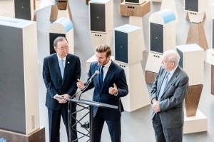 On 24 September 2015, UNICEF Goodwill Ambassador David Beckham speaks during the unveiling of the unique new digital installation Assembly of Youth, at United Nations Headquarters (UNHQ). Next to him are (left-right) United Nations Secretary-General Ban Ki-moon and UNICEF Director Anthony Lake. The innovative installation, designed for UNICEF by Google, ings the voices of young people to the heart of the United Nations General Assembly. Mr. Beckham, Mr. Ban, Mr. Lake, Noor Samee, 16, and Rodrigo Bustamante, 17, both from UNICEFs Voices of Youth initiative, unveiled the digital installation, which harnesses mobile technology and social media to deliver personal messages from young people across the globe directly to world leaders. The messages highlight the challenges young people face in their homes and communities  including extreme poverty, inequality, violence, deadly disease and conflict  as well as express their hopes for the future. The launch event was held in the context of the 70th session of the UN General Assembly, which opened on 15 September, and preceded the 2015 United Nations Sustainable Development Summit, taking place 2527 September at UNHQ.