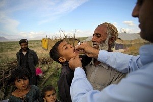 During door-to-door national polio campaign a polio team vaccinate children of nomad community lives in Aghbarg neighborhood of Quetta, the capital of Baluchistan province, Pakistan. Photographer: Asad Zaidi