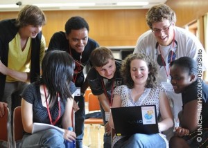 On 5 July, J8 youth delegates review their work on a laptop computer, at the Citizens' Cultural Centre in the city of Chitose on Hokkaido Island. They are: (left-right) Antoine Marie Oliver Bertrand-Hardy of France, Miho Kikuchi of Japan, Alexander Mario Wegner of Germany, Sergey Kononenko of the Russian Federation, Rose Elizabeth Stuart of the United Kingdom, Marco Zabai of Italy, and Nondumiso Thandeka Nkosi of South Africa. From 2 to 9 July 2008 in Japan, 39 young people from around the world gathered in the city of Chitose on Hokkaido Island for the Junior 8 (J8) Summit, hosted by the Government of Japan and UNICEF. The meeting parallels the annual summit of Heads of State/Government from Group of 8 (G8) countries, also hosted on Hokkaido Island this year. G8 countries are Canada, France, Germany, Italy, Japan, the Russian Federation, the United Kingdom and the United States of America. The J8 Summit provides a platform for young people to discuss global issues, advocate for solutions and actions from world leaders and foster a global youth movement around international issues. Participants, aged 13 to 17, are from all of the G8 countries. Young people from seven developing countries, Barbados, Côte dIvoire, Iraq, Kyrgyzstan, Mongolia, Nepal and South Africa, also participated. The meeting focused on three principal G8 topics: climate change and global warming; poverty and development; and global health, particularly child survival and infectious diseases, including HIV/AIDS. On 7 July, J8 delegates, selected by their peers, presented their recommendations to G8 leaders at their meeting venue in the nearby town of Toyako. The recommendations asked that world leaders listen to young people and outlined specific proposals to reduce global warming (including the creation of Green Indexes to evaluate the climate-impact of products produced globally); reduce global poverty (including by supporting child rights and conflict resolution); and increase positive health initiatives worldwide (including education on disease prevention and G8 matching funds for developing country health sectors).