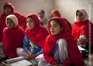 Girls attend class in a village in Nowshera District, Khyber-Pakhtunkhwa Province The school was damaged by the floods, but has been rehabilitated with UNICEF support. [#2 IN SEQUENCE OF TWO] In December 2010 in Pakistan, millions remain affected by the massive flooding that began in July 2010 and spread through most of the country. Nearly 200,000 people continue to live in camps in the provinces of Sindh and Balochistan, and millions more are returning to homes damaged by floodwater. Returnees confront persistently high water levels, washed-out roads and idges, and damaged infrastructure, property and livelihoods. Meanwhile, the arrival of winter has made the need for shelter increasingly acute. Road damage and security concerns related to ongoing conflict are hampering access by aid groups to many areas. Pakistan, one of four polio-endemic countries in the world, has also experienced a rise in polio infections, with 139 cases reported in 2010. In response, UNICEF, the World Health Organization (WHO), the World Food Programme (WFP) and others have launched coordinated programmes to meet the needs of flood-affected populations. Nearly 21,000 children under age five have received therapeutic feeding, and many more have received supplementary feeding. UNICEF and partners have immunized 11.7 million children against polio, and UNICEF is distributing childrens winter clothes, blankets, and additional supplies in areas that anticipate freezing temperatures. UNICEF has reached 150,000 children with temporary learning centres, 195,000 children with school supplies, and 180,000 with child-friendly spaces. The agency also continues to provide safe drinking water to over 3 million people per day and sanitation facilities to 1.7 million people. To date, 76 per cent of UNICEFs US$251 million funding requirements under the joint United Nations appeal have been met, including US$22.9 million in pledged funds.