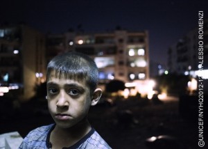 [THIS IMAGE IS FOR USE BY UNICEF ONLY  DO NOT SHARE WITH EXTERNAL MEDIA] A boy stands in Aleppo, capital of the north-western Aleppo Governorate. The city has been a site of prolonged fighting during the conflict. By late September 2012 in Syria, escalating war continues to take its toll on children and their families. Some 2.5 million people have been affected, of which 1.2 million  half of them children  have been displaced. Deaths, including of children and women, are estimated at 19,000. Syrians have also fled to neighboring Iraq, Jordan, Lebanon and Turkey; more than 226,700 have registered with the United Nations High Commission for Refugees (UNHCR), while over 75,000 are awaiting registration. UNICEF continues working with diverse governments, other United Nations organizations and local and international NGOs to respond to the needs of affected children both in and outside Syria. UNICEF also supports initiatives in education, water, sanitation and hygiene, health, nutrition and child protection, including the provision of child-friendly spaces and psychosocial assistance for children traumatized by their experiences in relation to the conflict. To fund this work, UNICEF has requested US$123 million, of which less than 25 per cent has been received to date.