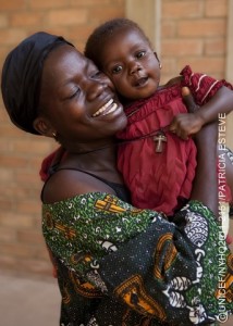 A woman living with HIV emaces her daughter in the maternal and child health unit at Moundou Hostpial in Moundou, the capital of Logone Occidental Region. The woman participated in a UNICEF-supported programme to prevent mother-to-child transmission of HIV (PMTCT). Her daughter is HIV-negative.  In April 2011 in Chad, malnutrition  a preventable condition  remains one of the greatest threats to childrens right to survival and development. One out of every five of Chads children dies before her/his fifth birthday. More than 100,000 of the countrys children aged 05 are malnourished, and 1 out of every 10,000 dies each day. Though chronic food insecurity is the main underlying cause of malnutrition, widespread poverty, rising food prices, desertification and climate change all play a part in this silent emergency. UNICEF is working with the Ministry of Health and other partners to improve community-based interventions structured around 205 nutrition centres throughout Chads Sahel belt. Between January and October 2011, these centres treated approximately 56,000 under-five children suffering from severe acute malnutrition. The effects of chronic malnutrition have only been exacerbated by conflict  both internal and external  that has left hundreds of thousands of internally displaced persons as well as refugees from Sudan and the Central African Republic dependent upon aid for survival. In addition to nutrition, UNICEF is also supporting programmes in other vital sectors, including education, health care, WASH (water, sanitation and hygiene) and child protection, for both Chadian and refugee communities. UNICEF is requesting US$46.4 million to continue ongoing assistance for the countrys most vulnerable in 2012.