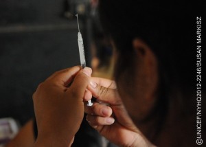 A health worker prepares a pentavalent vaccine at a health centre in the community of Corosal in Cobán Municipality, in Alta Verapaz Department. The pentavalent vaccine protects against five common diseases: diphtheria, tetanus, pertussis (whooping cough), hepatitis B and Haemophilus influenza type b (also called Hib, a cause of pneumonia and meningitis). The centre, which is open once a month, serves a population of 1,000, and is run by the Ministry of Health with support from UNICEF. Volunteer health workers provide routine health care and immunizations for pregnant women and children under 5 in five surrounding communities. [#2 IN SEQUENCE OF THREE] In November 2012 in Guatemala, the Government and other partners are continuing to assure sustained routine immunization of children  now reaching 92 per cent of all infants  against a range of vaccine-preventable diseases. The countrys last endemic case of measles was in 1997. In the entire Americas Region (covering North, Central and South America), the last endemic measles case was in 2002 and the last endemic case of rubella was in 2009  part of global efforts to eradicate these diseases. Worldwide, measles remains a leading cause of death among young children: In 2010, an estimated 139,300 people  mainly children under the age of 5  died from the disease. Nevertheless, these deaths decreased by 71 per cent from 2001 to 2011, thanks in part to the Measles & Rubella Initiative, a global partnership led by the American Red Cross, the United Nations Foundation, the United States Centers for Disease Control and Prevention (CDC), WHO and UNICEF. In Guatemala, despite this success, significant other challenges for children remain, much of it related to poverty levels that affect more than half of all children and adolescents. Poverty also contributes to chronic malnutrition affecting half of all under-5 children (with higher rates among indigenous populations); an average national education level of under six years of primary school (under three years for the rural poor); and high, though decreasing, rates of violence. Guatemala is also one of the worlds most vulnerable countries to climate change, suffering a major climate-related emergency every year since 2008. On the positive side, birth registration is improving, with more than 95 per cent of newborns now being registered. UNICEF is working with the Government and other partners to sustain achievements in health, address the high levels of malnutrition, strengthen responses to crimes against children and increase protection services for children throughout public services.