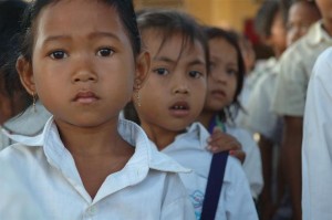 School children wait in line.