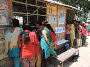 Guardians peek in into the class. Back to school makes Back to normal photos from Rupa Joshi 31 May 2015