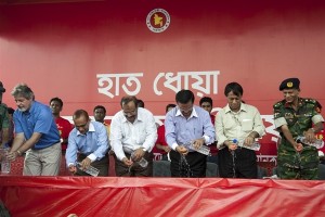 (left to right) Mr. Carel de Rooy, UNICEF Representative, Bangladesh, Anwar Hossain Sikder, Acting Country Director, Plan Bangladesh, Md. Nuruzzaman, Chief Engineer, Department of Public Health Engineering, Jahangir Kabir Nanak, State Minister, MO Local Government, Rural development and Cooperatives, Mr. Monzur Hossain, Secretary Local Government division, and Col. Kamruzzaman Khan, Principal, Dhaka Residential Model College, begin the hand washing at the Dhaka Residential Model School and College field, Dhaka, Bangladesh on the occasion of Global Hand Washing Day 2010, on 20 October 2010. More than fifty thousand students from different educational institutions on Wednesday assembled at the Residential Model School and College in the city and pledged to wash their hands with soap as part of the observance of Global Hand washing Day 2010. Students from primary and secondary schools including madrasas took part in the one-day event to celeate the third Global Hand Washing Day. According to a report by UNICEF and WHO , Bangladesh is among the 10 countries in the world that report the largest number of child deaths due to diarrhea. A total of 50,800 children under the age of five years die every year in Bangladesh from diarrheal diseases. The death toll worldwide is 3.5 million. Research shows that washing hands with soap is a highly cost-effective health practice that can reduce the incidence of diarrheal disease by over 40 per cent. But, despite its life-saving potential, effective handwashing is seldom practiced as many people do not use soap and only wash one hand. Global Handwashing Day was launched in 2008 as a public-private partnership with Unilever, UNICEF and Governments as key players. The partnership is now endorsed by 13 international and national organizations. Although the world celeated the day on the 15th of October, Bangladesh is observing it on the 20th since the 15th was a public holiday.