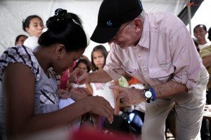 On 15 December, (right) UNICEF Executive Director Anthony Lake administers a dose of oral polio vaccine to 2-month-old Winnoa Mae Oliva, who is being held by her mother, at the Rural Health Unit Office in the town of Guiuan in Eastern Samar Province, Eastern Visayas Region. Guiuan is among the areas worst affected by Typhoon Haiyan. UNICEF is working to re-establish the cold chain to deliver vaccines to more than 1 million children in typhoon-affected areas. In mid-December 2013, UNICEF Executive Director Anthony Lake visited the Philippines, where government-led recovery and relief operations continue in the wake of the devastation caused by Typhoon Haiyan, which struck the country on 8 November. Some 14 million people  including 4 million who are displaced  have been affected by the storm, one of the strongest ever to make landfall. The storm (known locally as Yolanda) also destroyed homes, schools, hospitals, roads, communications and other basic infrastructure, and damaged power and water supply systems. Mr. Lake met with schoolchildren and with displaced people sheltering in an informal tent city and also participated in a mass national campaign to immunize typhoon- affected children against measles and polio. Children are also receiving vitamin A to help boost their immunity during the campaign, which is supported by the World Health Organization, UNICEF and other partners. Mr. Lake also visited a UNICEF-supported child-friendly space providing psychosocial assistance for children traumatized by the disaster and a UNICEF warehouse serving as a distribution hub for supplies to affected areas. UNICEF has appealed for US $61.5 million for its typhoon response  including programmes in water, sanitation and hygiene, child protection, nutrition, health and education  through May 2014.