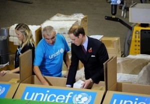 The Duke of Camidge (R) helps UNICEF warehouse worker Peter Jones (L) to pack emergency health kits, ready to be sent to East Africa. 2. November 2011, UNICEF Supply Division, Copenhagen The Duke and Duchess of Camidge (William and Catherine) accompanied by the Crown Prince and Crown Princess of Denmark (Frederik and Mary) made a special visit to the UNICEF global supply centre in Copenhagen to help maintain the world’s attention on the humanitarian crisis in East Africa, which has left more than 320,000 children so severely malnourished that they are at imminent risk of death unless they get urgent help. UNICEF’s supply centre includes a warehouse the size of three football pitches where essential supplies for children around the globe are sourced, packed and distributed. These include food, water, special nutritional supplies for the most malnourished children, vaccines, education materials and emergency medical kits. Whilst at the supply centre both couples were iefed on the desperate situation in the region by UNICEF specialists. The royal couples then joined UNICEF warehouse staff on packing line, and helped to pack emergency health kits, ready to be sent to East Africa. Each kit will provide life-saving supplies to over 1000 people. The Duke and Duchess and the Crown Prince and Princess then toured the warehouse, seeing the huge variety of supplies that are sent to emergencies around the world, including ready-to-use therapeutic food for severely malnourished children under five years old and supplementary food to support-families, emergency health kits, vaccines and water supplies including water purification tablets. At the end of their visit the Duke of Camidge said “An incredible amount is being done. UNICEF is leading the way and doing a fantastic job, but sadly there’s lots more still to do, and that’s why we’re here today” To donate to UNICEF East Africa Appeal please visit www.eastafricacrisis.org