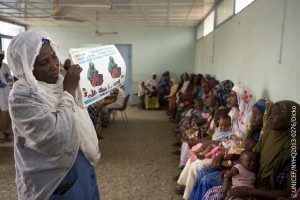 Social worker Oumarou Zeïnabou conducts an awareness session for women, many holding their infants on their laps, at the Zinder Maternity Centre for Integrated Health, in Zinder, capital of Zinder Region. Ms. Zeïnabou is holding an educational flipchart bearing illustrations of two women, one feeding and one eastfeeding her infant, as well as a variety of nutritious foods. The chart says, in French, Your sick child should eat and eastfeed more than is typical in order to heal and avoid malnutrition.  In May 2013, Niger continues to host an estimated 50,000 Malian refugees  further constraining the countrys already limited resources. Both Niger and Mali are among nine countries in the Sahel region  also including Burkina Faso, Chad, the Gambia, Mauritania, Senegal, and the northern parts of Cameroon and Nigeria  facing a severe food and nutrition crisis. The emergency is the result of repeated drought-related food shortages. Though conditions have improved since the height of the crisis in early 2012, an estimated 3.1 million people in the Niger are affected by food insecurity, including over 376,700 children under age 5 suffering from severe acute malnutrition. In April, ongoing wet feeding activities benefitted 5,769 children aged 6 to 59 months in four refugee camps. UNICEF is also supporting programmes in education and child protection, including the provision of child-friendly spaces, in the camps. Initiatives to provide safe water and sanitation facilities to refugees are extending to some host communities, and responses to a recently declared cholera epidemic are also ongoing. To continue emergency responses throughout 2013, UNICEF requires nearly US$33.8 million, of which half remained unfunded by 22 May.