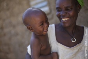 Niger, November 2012. Haouaou Abdou, 52, mother of 6 children is smiling at her youngest son Issiakou, 8 months, in the village of Mazadou Abdou. By Jessica Mony In 2011, droughts across the Sahel plunged millions of families into a food crisis. A year after UNICEF and partners emergency response began, we ask ourselves how can we stop this vulnerability and persistent cycle of suffering? A poor, rural Nigerien village 600 people may hold the answer. Here, despite every familys struggle during the drought, no child suffered malnutrition in 2012. Just three years ago it was rare for a week to go by without a child dying from combinations of malnutrition, diarrhoea and malaria in Mazadou Abdou village. During the frequent droughts, at times this would rise to two or three. No family was spared the pain of loss and mourning. Haouoau and Loli Abdou are just one set of parents that faced this tragedy. Loli holds up three fingers and lists that in 2000, 2002 and then again in 2004 they lost three children to malaria. Looking solemnly at their healthy 8 month baby boy Issiakou, it is clear the scars will likely never heal for this family. Sadly, their situation is not unique in this or any other village across the Sahel. Fortunately, in 2008 a simple UNICEF programme of family practices helped change all of this. The practices are simple and include exclusive eastfeeding for the first six months of life; complementary feeding for children after six months; proper hand-washing techniques; treatment of diarrhoea; knowledge of how to seek medical care; immunisation; using mosquito nets to prevent malaria; promotion of delayed pregnancies and girls education. The results of adhering to these practices for the children of Mazadou Abdou have been significant. Moutari Louali, a community volunteer who is helping to implement the programme explains the impact. Before the programme started, around four to five children would die every month from malaria, diarrhoea and other diseases. Now, during the whole of this year only three children died, and this was because of miscarriages. From the chief through to parents and children themselves, the whole village is determined that no child should die from preventable diseases. Haouaou is clearly proud of the result In this village we didnt have any malnutrition because we take care of our children. I am very happy about how healthy our children are. At the heart of the programme are volunteers like Moutari who, along with two other volunteers selected by the community, ensure that every family implements the practices and monitors progress. Every week the group visit up to five families to run information sessions. Today, Moutari is visiting Hoauoaus household. Starting with an update on the health of their children, Moutari then calls a mother and her child forward to demonstrate a particular practice. Today its the use of mosquito nets and hand washing. Everyone here comes to listen and learn. Haouaou points at two of her daughters who were born before and after the programme started and she learnt about the benefits of exclusive eastfeeding. Look you can see this one is much stronger. Whilst drought, hunger and vulnerability are an ongoing reality for these families, their efforts to implement the programme are the key to ensuring their children not only survive, but are resilient through times of drought and extreme hardship. Issa Iahim the 63 year old chief of Mazadou Abdou describes the precarious situation many families across the Sahel live in. In this village our life is based around farming. The difficulty of this life is that if the rainy season doesnt give a good harvest, life becomes extremely difficult for us. For now the health of their children is safe, but the challenges ahead for the village are immense. A community run cereal bank will help tide them over for a while, but after this the only other option for many families is for husbands and fathers to head to Nigeria to search for work. Haouaou has thirty bowls of millet to feed her family until the harvest a year away. It will only last a month. She holds out the bowl and laughs nervously. What can we do? Whilst Mazadou Abdous families continue to walk a tightrope of vulnerability, their newfound knowledge will keep their children alive and healthy. It is not the whole solution, but it provides the hope of a future for their most precious resource, their children. The Chief is thankful for how far they have come. We are very proud and happy for what we have done here. We thank God, we thank the people who taught us these practices, but he is also conscious of the toll of chronic hunger on the future of this community; If a man is hungry he cannot hear, he cannot learn anything. The impact of the emergency response across the Sahel can be seen in the short term in the lives saved and the malnutrition prevented. For vulnerable families like Haouaous though, building resilience and food security will be key to long term change. This village has demonstrated the success of community driven initiatives to improve childrens health, but more support is needed to ensure communities across the Sahel are able to withstand crises. Haouaou tries not to think about what might happen a year from now; Nobody can forsee the future. Even if we wait and hope for the best, anything can happen at any moment. UK Natcom - for local copies of the files: Y:Key-initiativesIFSahel-Stories-2012Niger