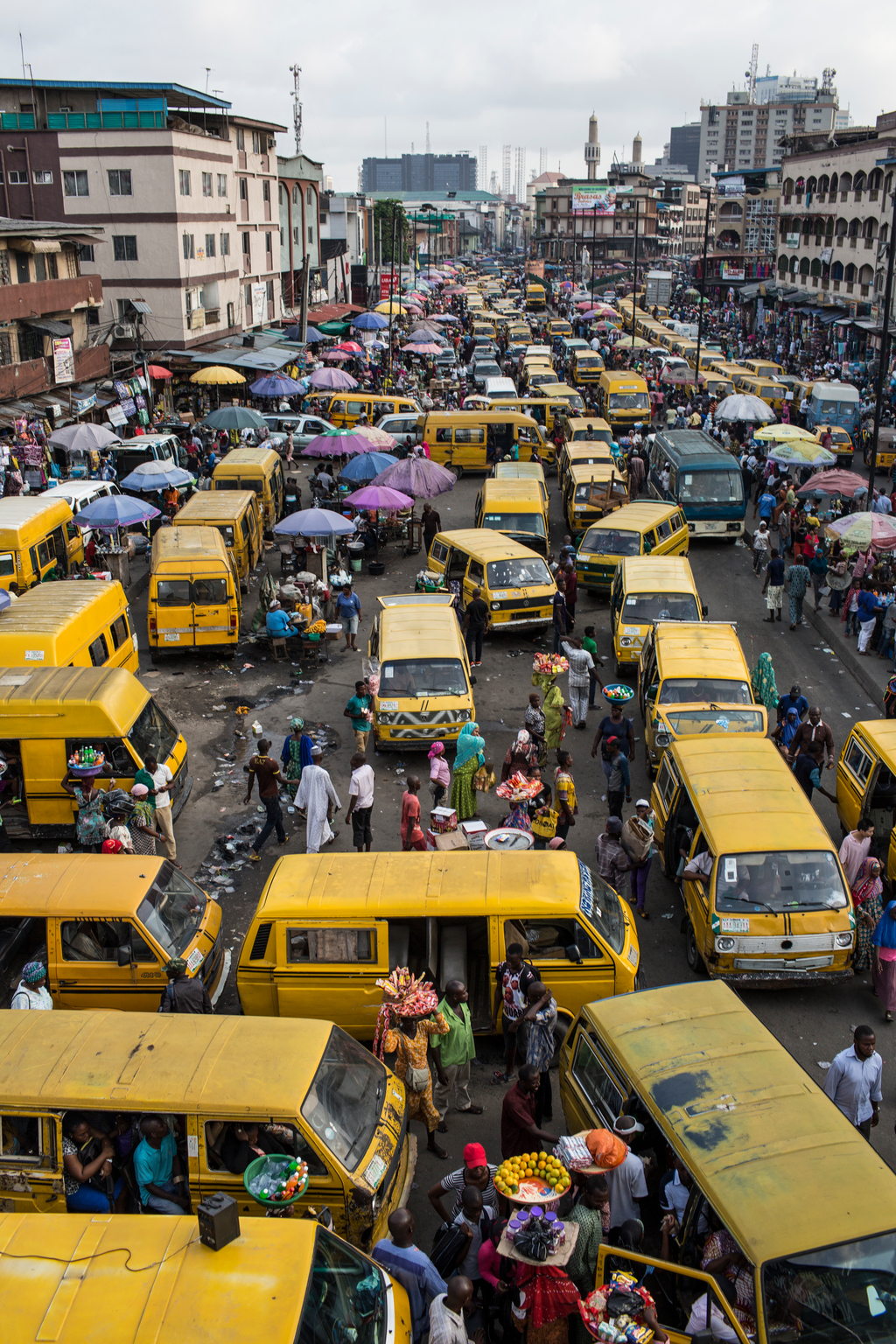 On 27 October 2016 in Lagos, Nigeria, street vendors sell their wares at Oshodi market as commuters make their way home, creating heavy traffic and fumes. Both vendors and commuters complain of headaches and trouble eathing as they inhale the toxic fumes from car exhaust as they are stuck in traffic or on the streets. Almost one in seven of the worlds children, 300 million, live in areas with toxic levels of outdoor air pollution - six times higher than international guidelines according to a report from UNICEF, Clear the Air for Children, released ahead of COP 22. UNICEFs findings, the first of its kind and based on satellite imagery, also show that around 2 billion children in total live in areas where outdoor air pollution exceeds limits set by the World Health Organization as being safe for human health. This air pollution is caused by factors such as vehicle and factory emissions, heavy use of fossil fuels, dust and burning of waste. Indoor pollution is commonly caused by use of fuels like coal and wood for cooking and heating. Taken together, outdoor and indoor air pollution are one of the leading dangers facing children -- they are a contributing factor in the deaths of almost 600,000 children under five every year. This figure represents nearly 1 in 10 under-five deaths. Air pollution is also linked with poor health and diseases among millions more children that can severely affect their overall wellbeing and development. It causes difficulty eathing; studies show it is linked with, and can exacerbate asthma, onchitis, and the inflammation of airways, as well as other underlying health issues. Children who eathe polluted air are at higher risk of potentially severe health problems-- in particular, acute respiratory infections such as pneumonia. Children are more susceptible to the harmful effects of both indoor and outdoor air pollution as their lungs, ains and immune systems are still developing and their respiratory tracks are more