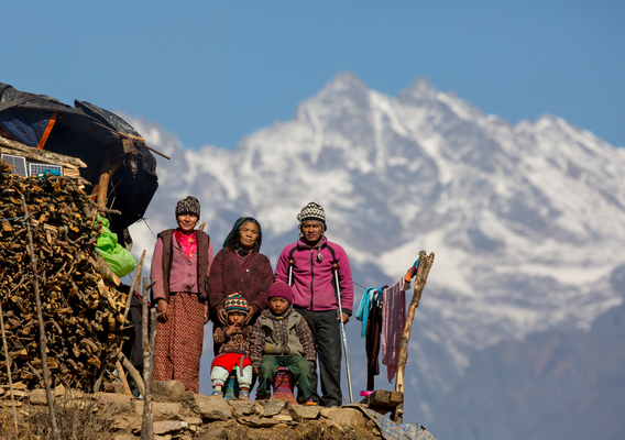 On 16 January 2016, Dhan Bhadur Gurung, aged 32, stand on crutches along with his family member at his temporary shelter in Gupsi Pakha, in Laprak, in Gorkha district, Nepal. Dhan Bhadur is the only source of income for his five members family, but during April 2015 earthquake he lost his house and also oke his leg, since then he is not able to generate any income for his family. Purnimaya Gurung, aged 69, a mother of Dhan Bhandur, has received the emergency top-up cash grant provided by UNICEF. Laprak is one of the epicenter villages of Gorkha district, where more than 600 hundreds houses were destroyed during earthquake on 25 April 2015. Hundreds of earthquake victims, particularly the elderly and young children living in shelter of highland altitude have been facing a harsh winter season after snowfall.