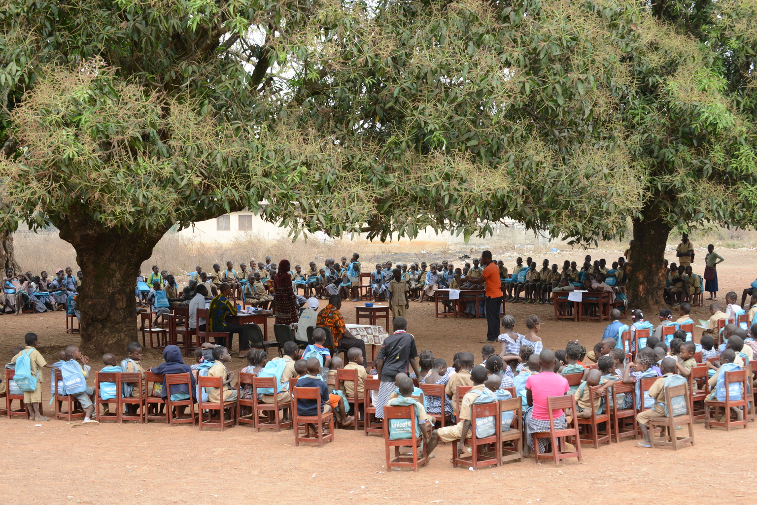 Children gather for a reading club at a primary school in Koro, near Touba, Côte d'Ivoire, Friday 19 Feuary 2016. After years of conflict Côte dIvoire is now repositioning itself in Africa with the aim of becoming an emerging economy by 2020. With economic growth estimated at 9 percent, investors are streaming in. Yet nearly 50 percent of the population still lives in poverty. Maternal and child mortality, education, health care and protection of women and children remain key challenges. Significant progress has been made in Côte d'Ivoire since education became compulsory for children aged 6 to 16 in 2015 - the enrolment rate rose from 79% in 2015 to 88% in 2016. However, the number of children out of school remains high, especially in the northern and the western regions of the country. UNICEF is supporting the development of the Education Sector Plan (20162026) and also helping the Ministry of Education and partners to identify and address the reasons why children are not in school. One of the challenges Côte d'Ivoire still has to address is gender disparity. When faced with the choice, parents routinely choose to send boys to school before girls, a gap which widens significantly at secondary school level. Girls are also more likely to drop out of school because of early pregnancy and marriage, to care for younger siblings or to undertake other household chores.